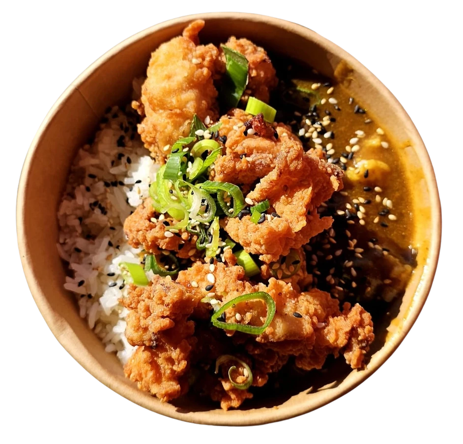 Crispy karaage chicken with curry served over rice